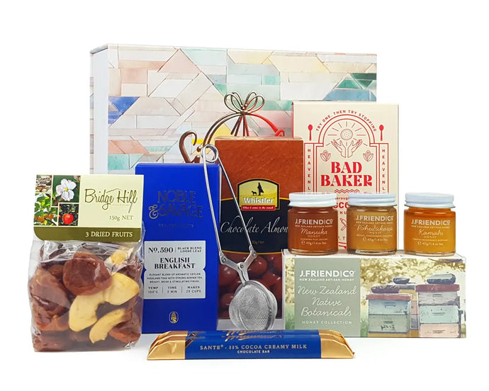 Gift Box with gourmet goodies in front of it