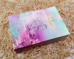 Multi-coloured pastel design giftbox branded with 'Simply Because'