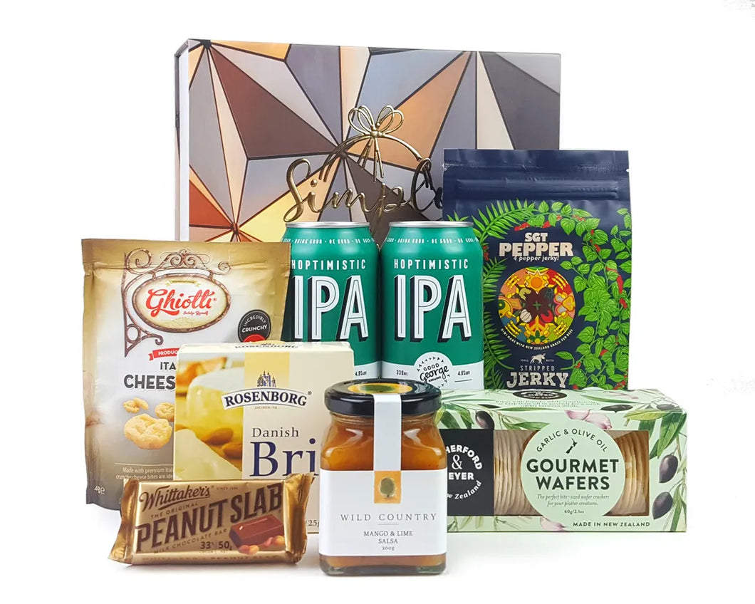 Giftbox with gourmet goodies and beer in front