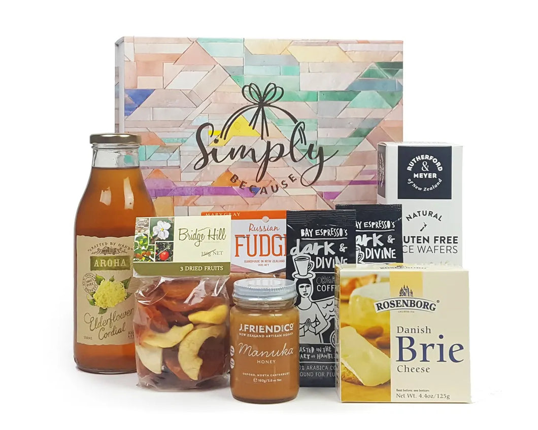 Giftbox with gluten free good and drink in front