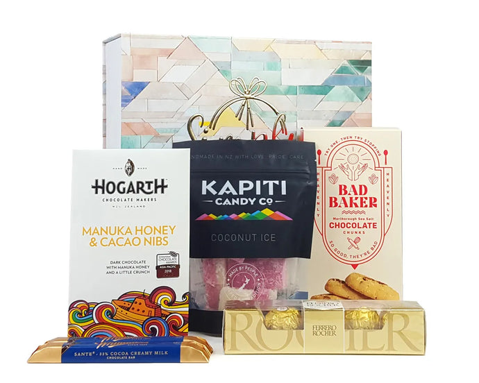 Giftbox with gourmet sweet treats in front