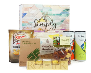 Giftbox with food and drink in front